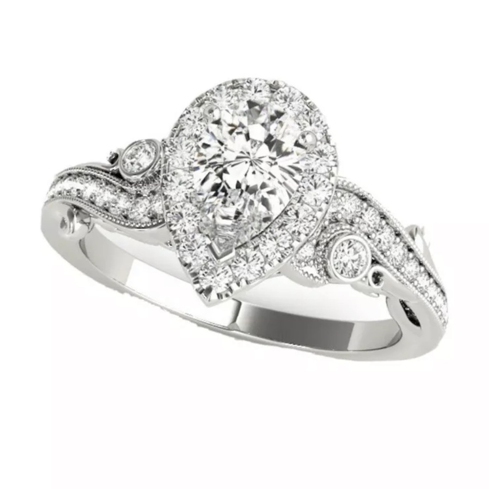 Beautiful white gold pear shaped engagement ring sz 7.